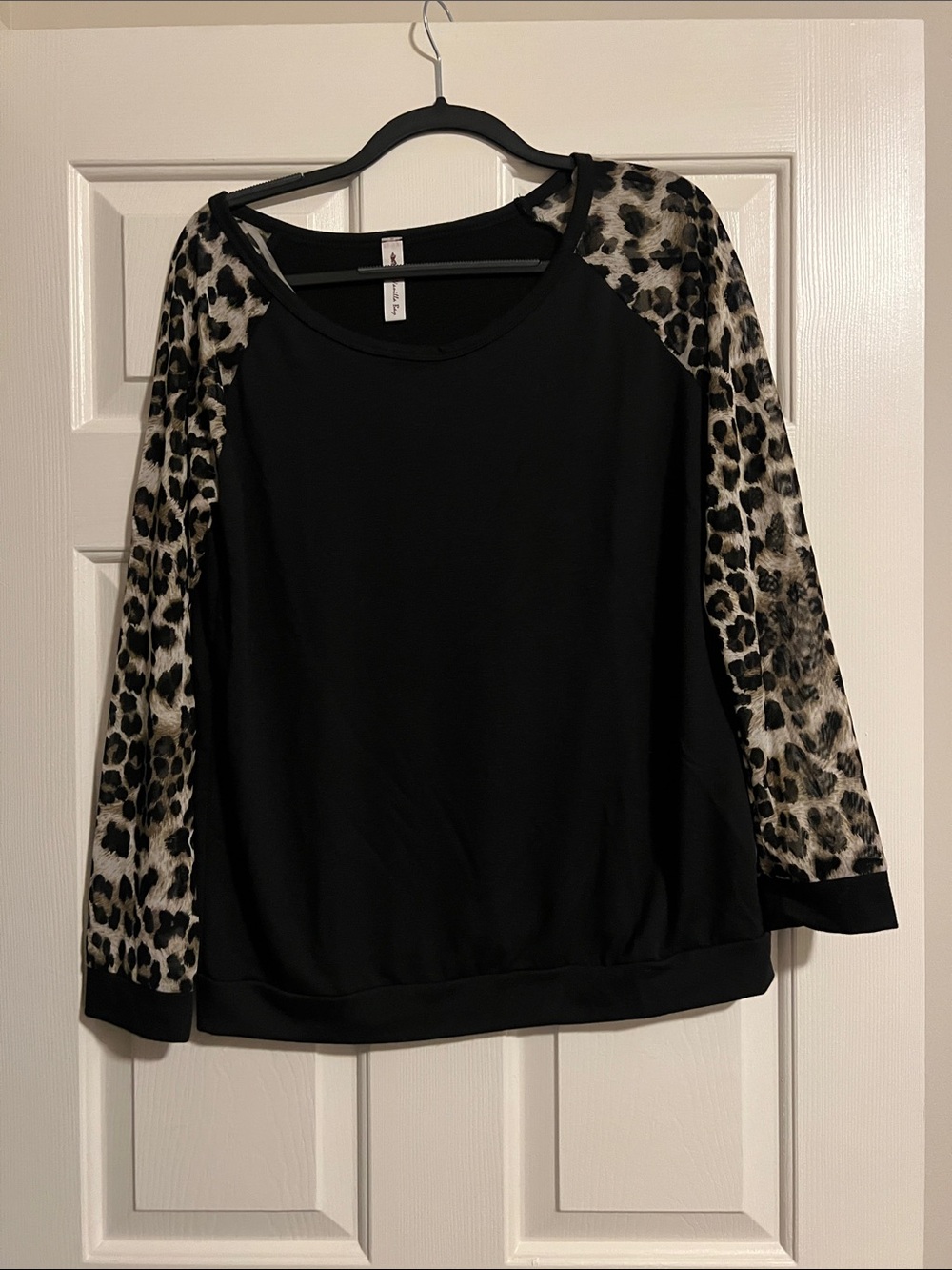 Vanilla Bay Black top with Leopard-Print Sleeves